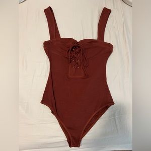 Shop Luna b: Knit lace up body suit